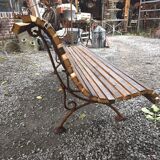 Cast iron garden bench with wooden slats