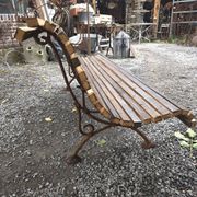 Cast iron garden bench with wooden slats
