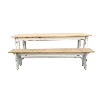 Farmhouse table with its two benches