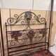 Venetian bed in iron and cast iron from the Art Nouveau period with polychrome decorations
