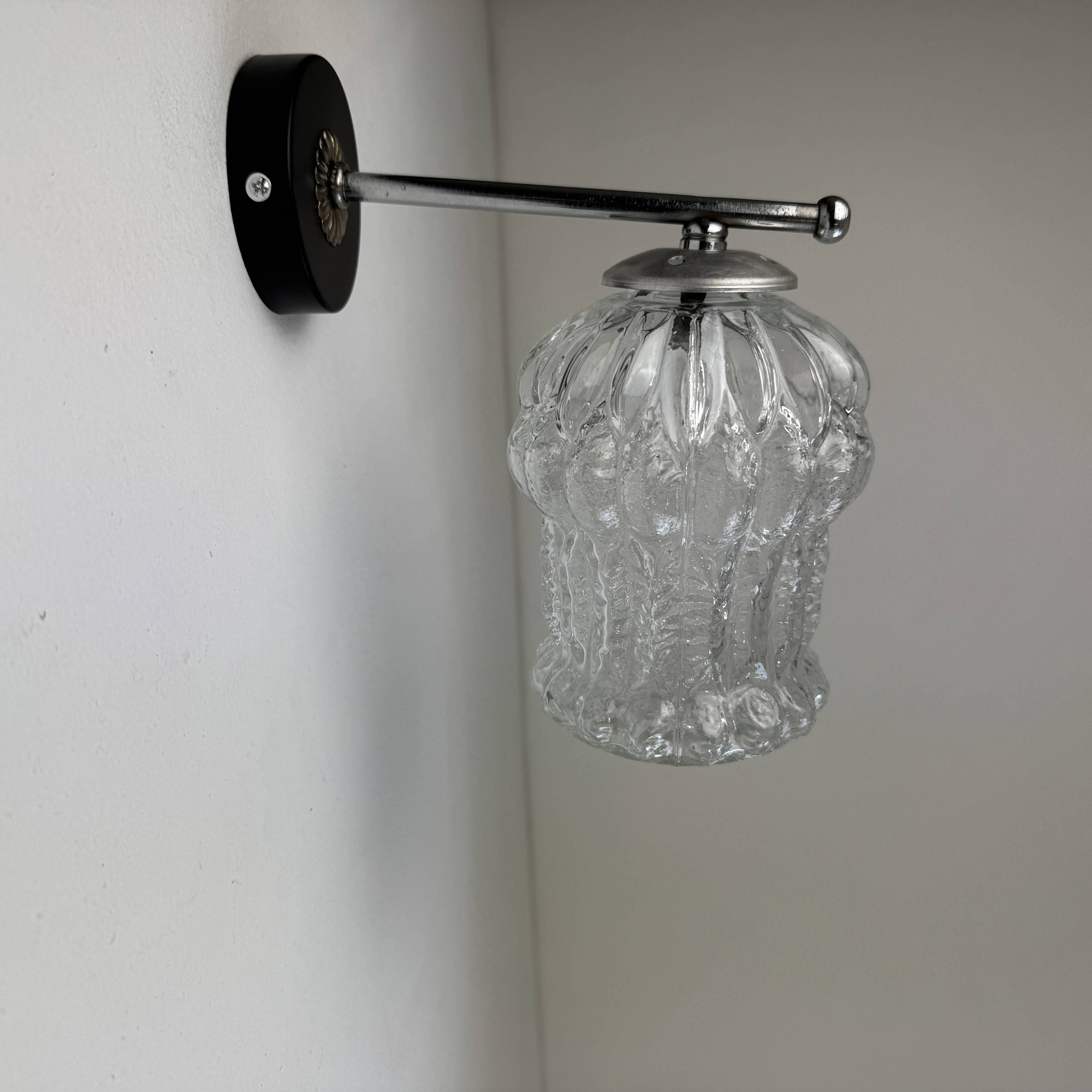 Vintage metal and glass wall light.