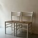 Paire de chaises vintage en bois blanc et paille