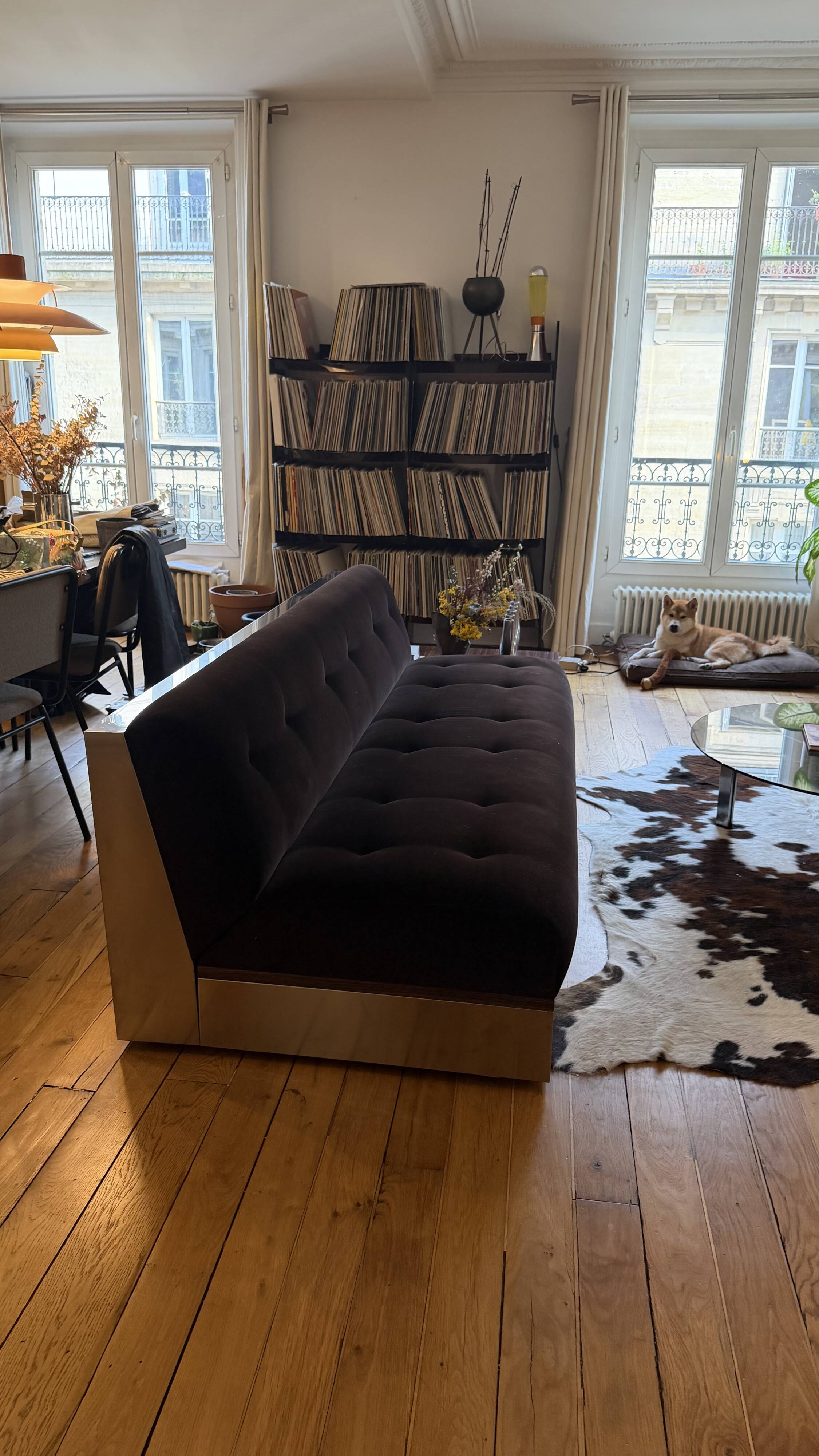 Red Edition Stanley 3-seater sofa with matching chocolate velvet storage.