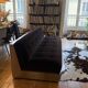 Red Edition Stanley 3-seater sofa with matching chocolate velvet storage.