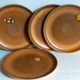 Quatre assiettes de potier en grès émaillé vintages