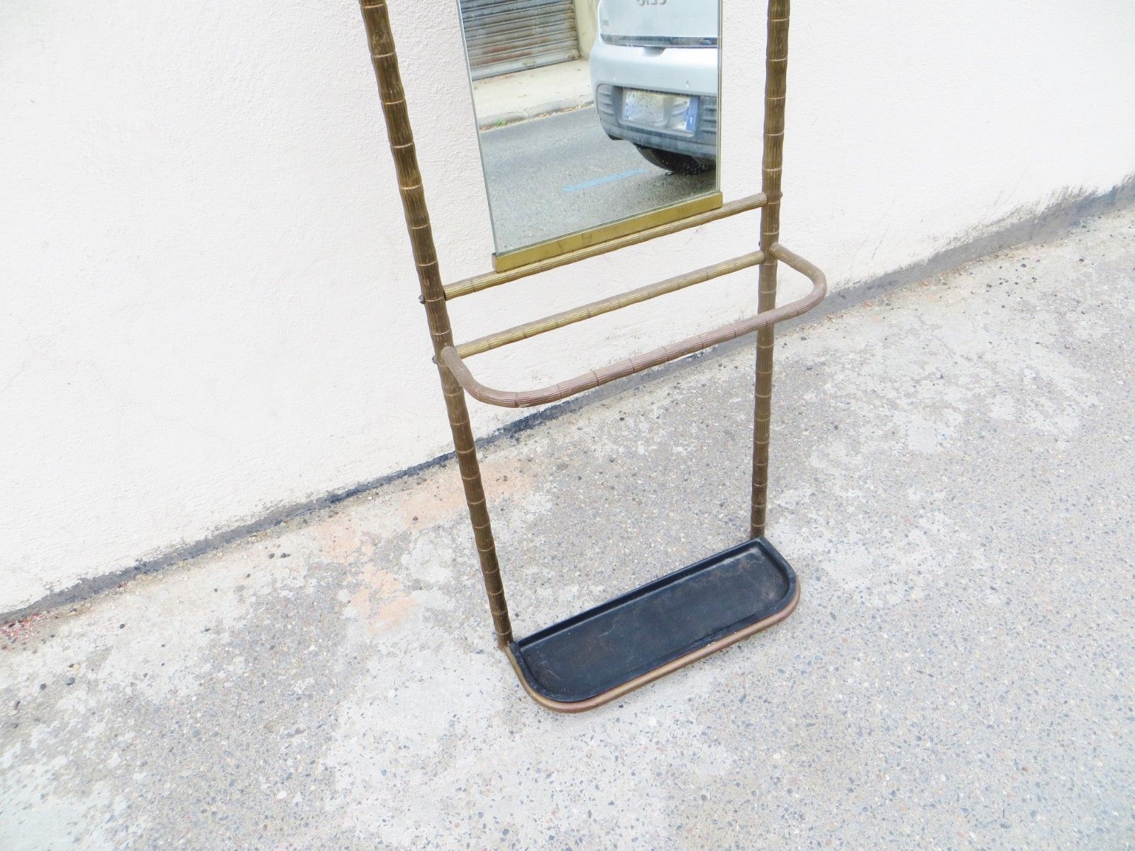 Wearing coat of the 60s in brass