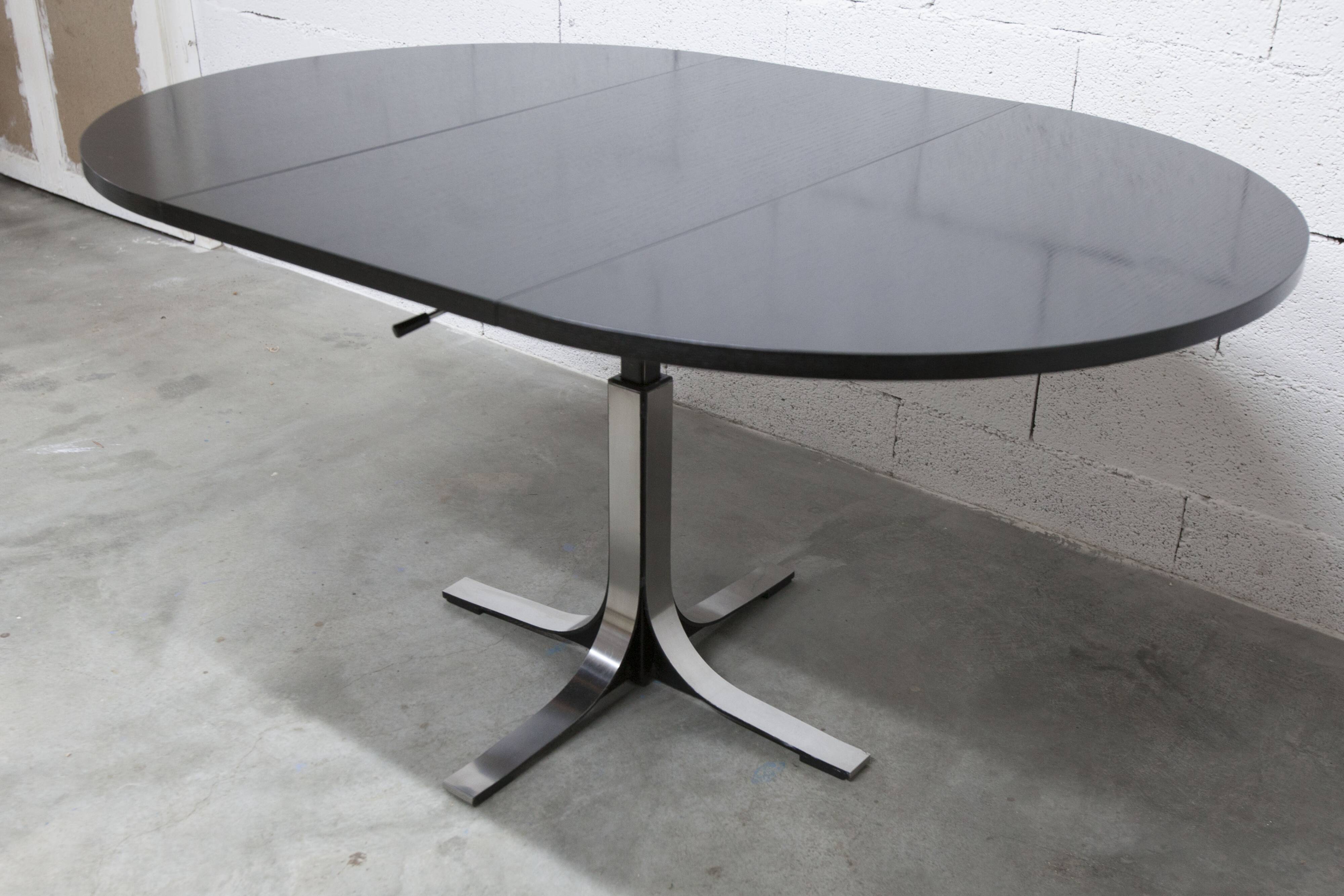 Round table rises and lowers Osvaldo Borsani black and chrome with extension