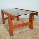 Coffee table in solid elm and smoked glass of the 1970s