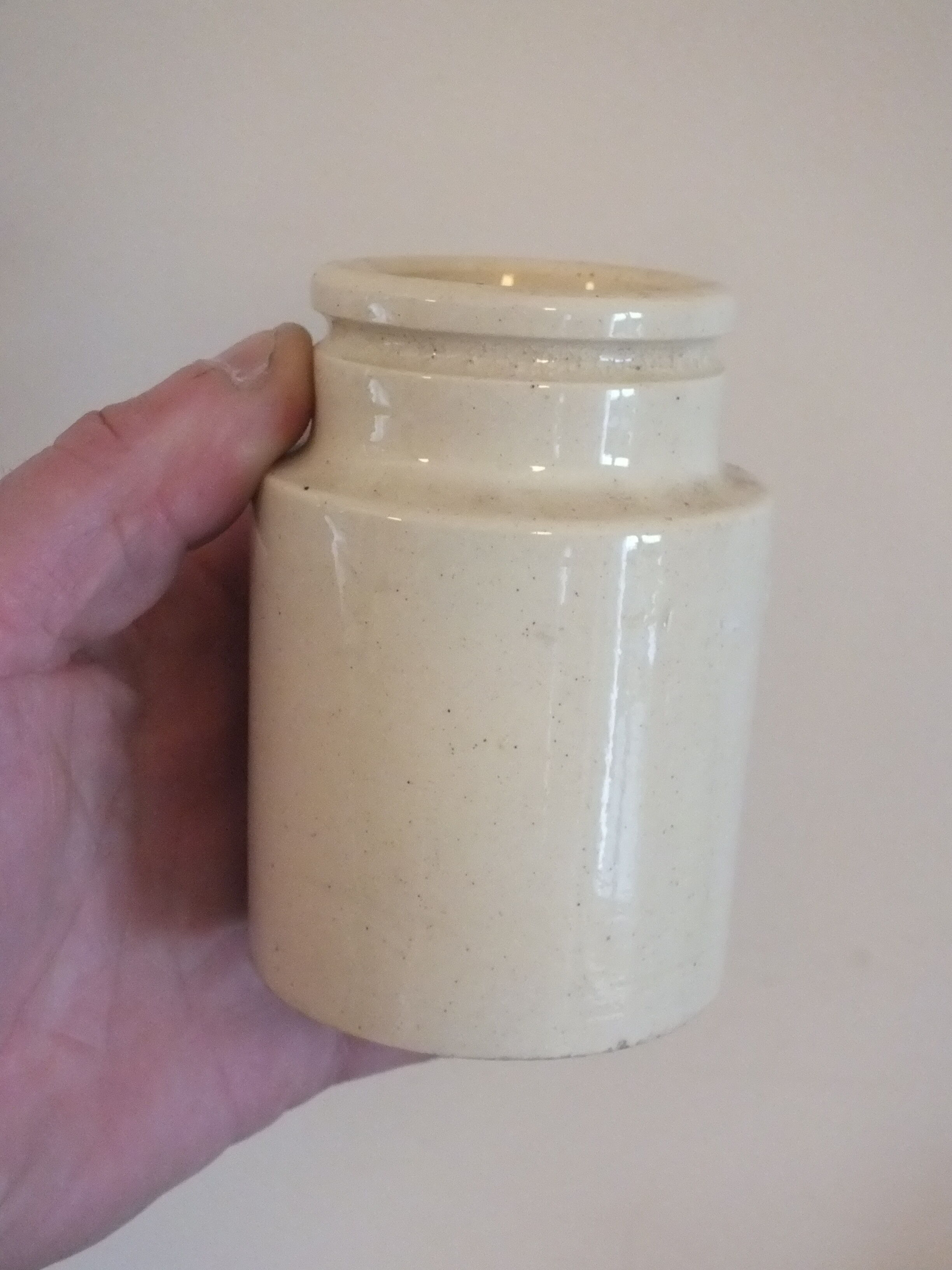 Old creamy white ceramic mustard pot