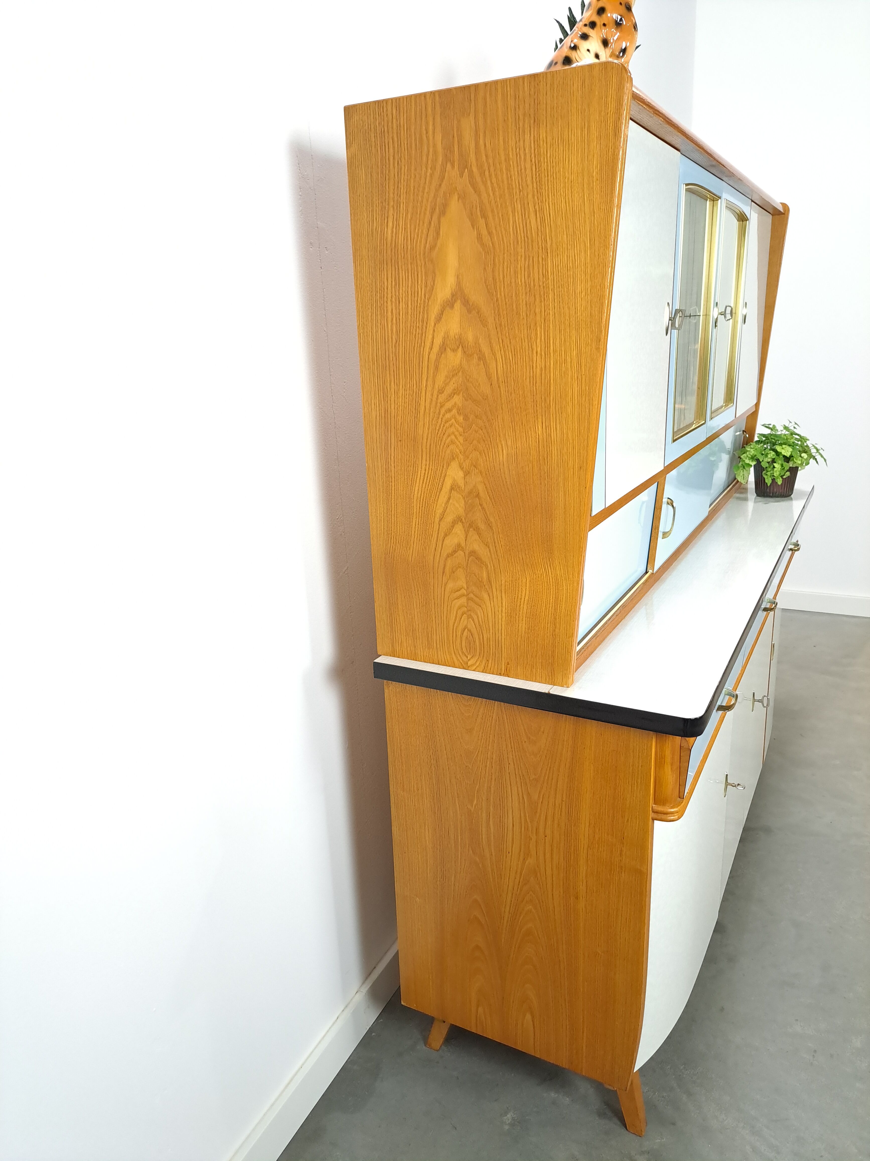 50s vintage kitchen cabinet with brass and formica