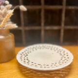 Coupe sur pied ancienne en porcelaine