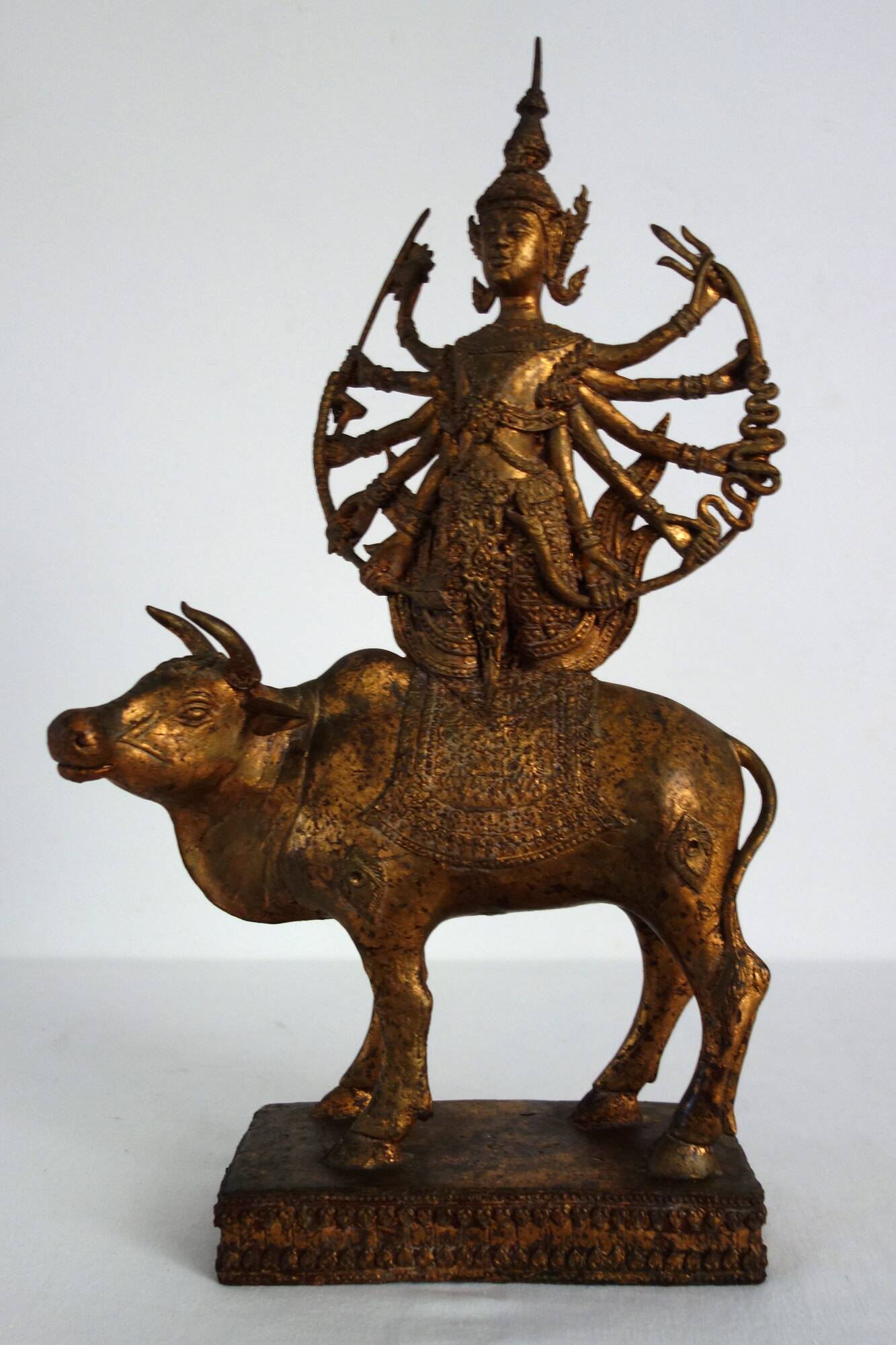 Golden bronze statue of Shiva on Nandi, India, mid-20th century.
