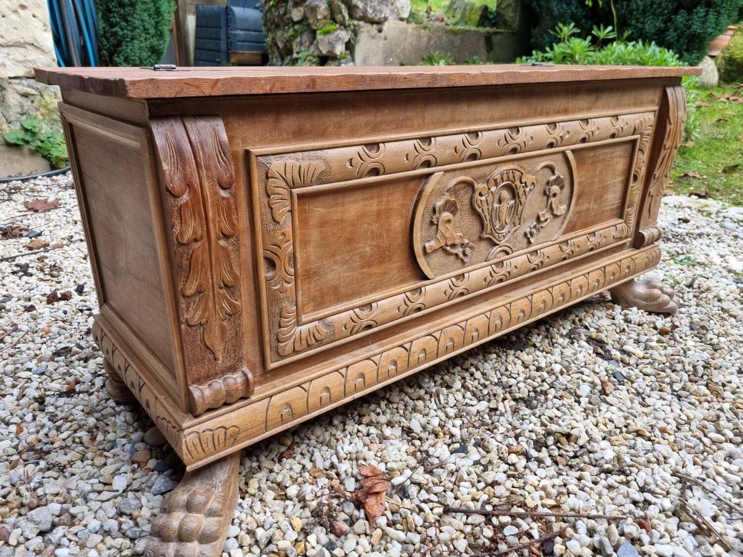 Wooden chest with lion paws