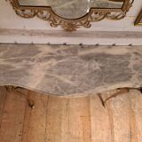 Console and its mirror in bronze and marble