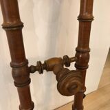 Wooden coat rack with swivel hooks