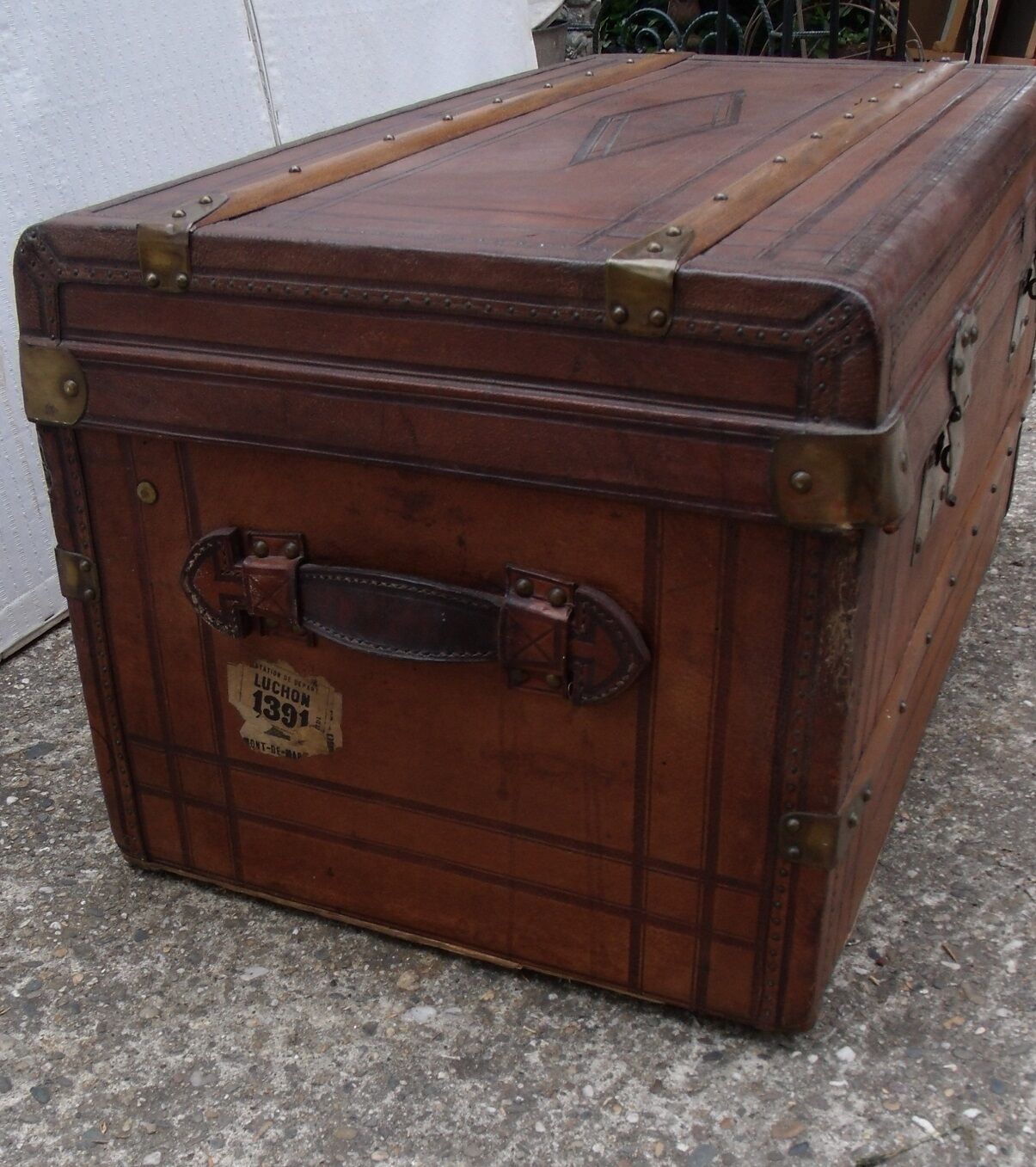 Old wooden trunk covered leather travel chest