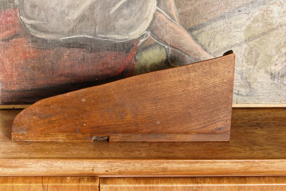 Small brutalist corner shelf in solid oak.