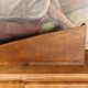 Small brutalist corner shelf in solid oak.