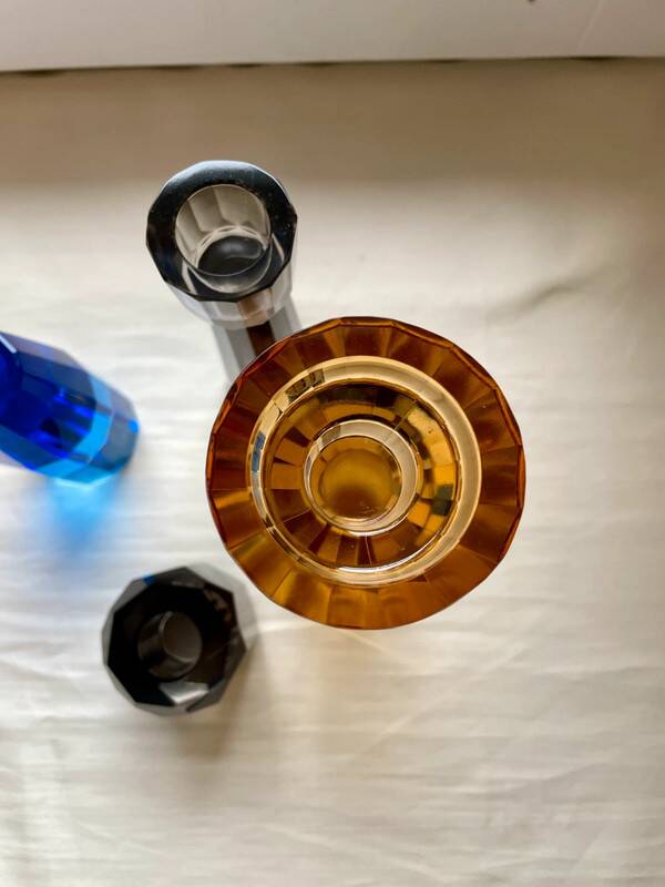 4 designer candle holders in colored glass