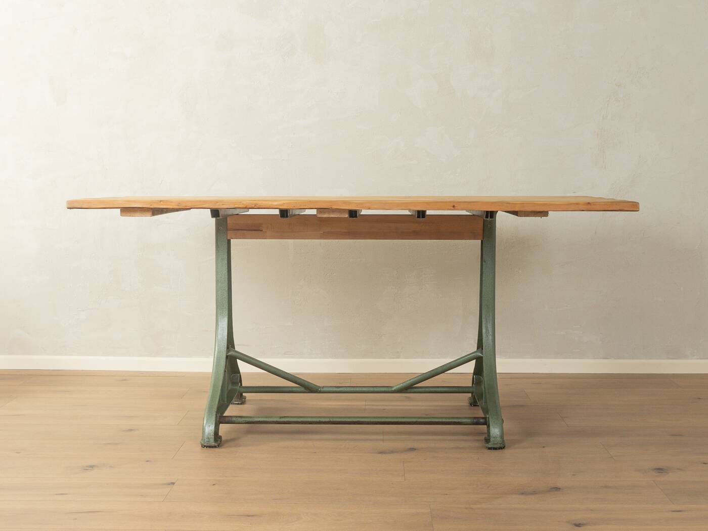 Unique dining table with cast iron base and solid wood top