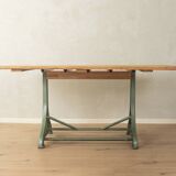 Unique dining table with cast iron base and solid wood top