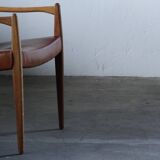 Pair of vintage Per-Olof Scotte "Premier 69" oak armchairs in cognac leather