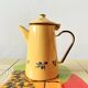 Old coffee maker in yellow enameled sheet metal - olive decor
