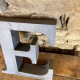 Letter metal - e