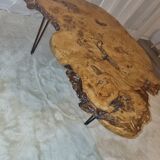 Tripod coffee table in natural solid elm magnifying glass