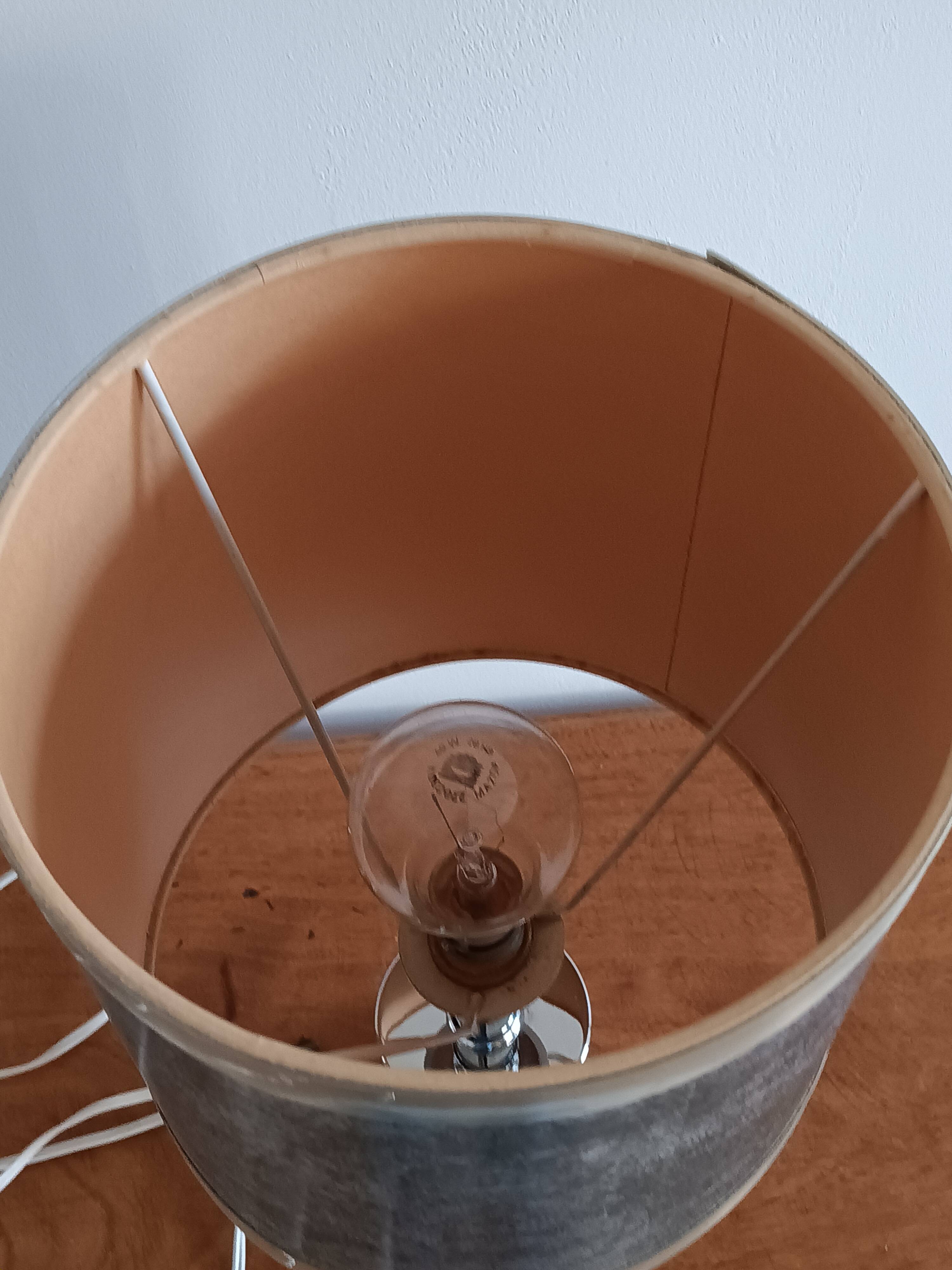 Chromed metal lamp and metallic paper lampshade. 70s