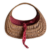 Wicker gondola basket from 1960 lined with cotton with red polka dots.