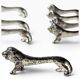 Series of antique knife rests in the shape of a lion, silver-plated metal.