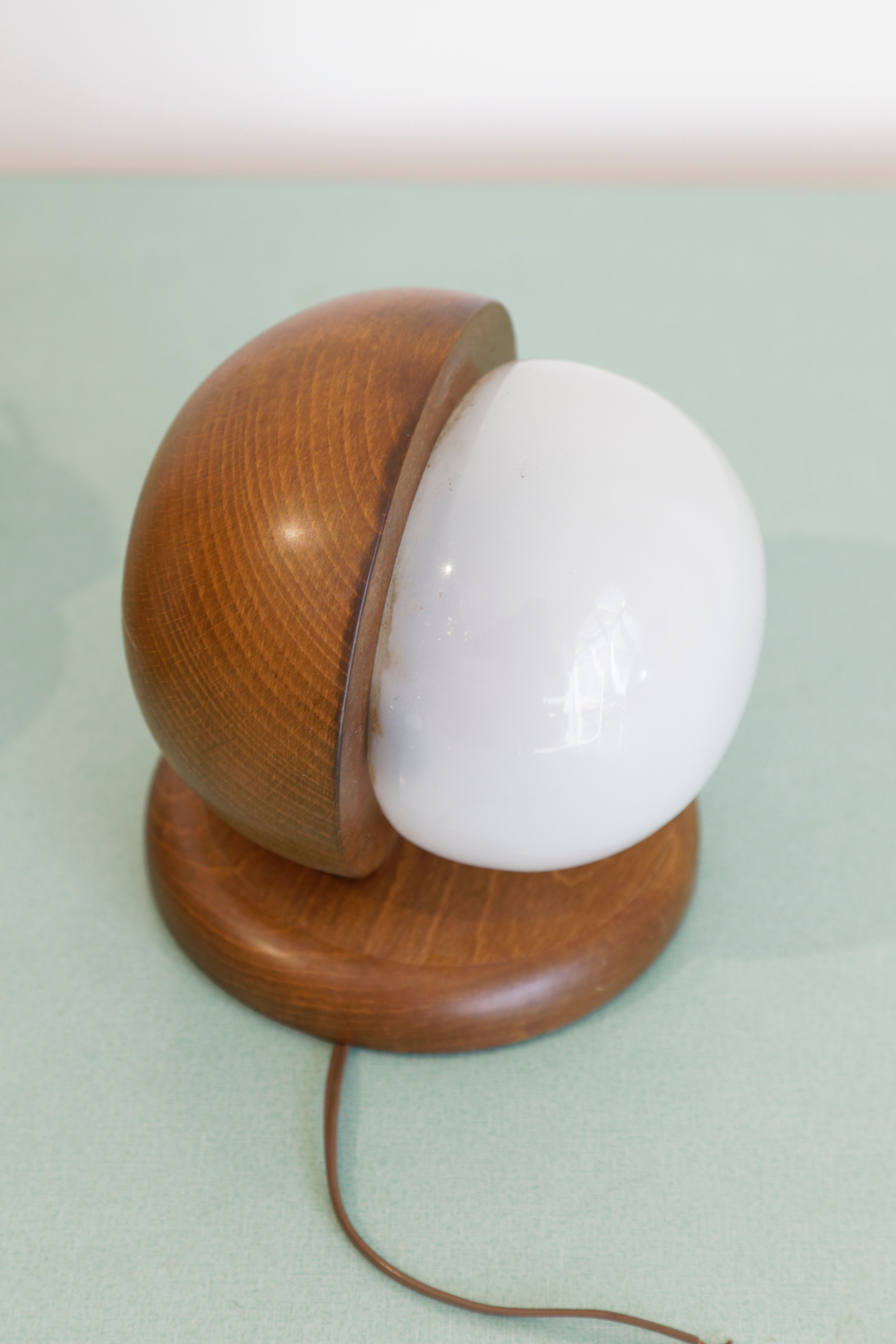 Pair of wood and opal sphere wall lamps