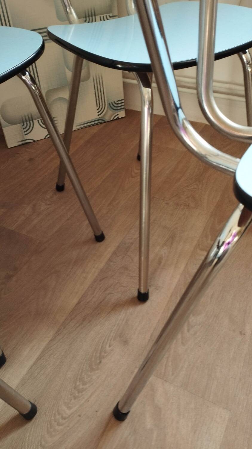 4 blue Formica chairs