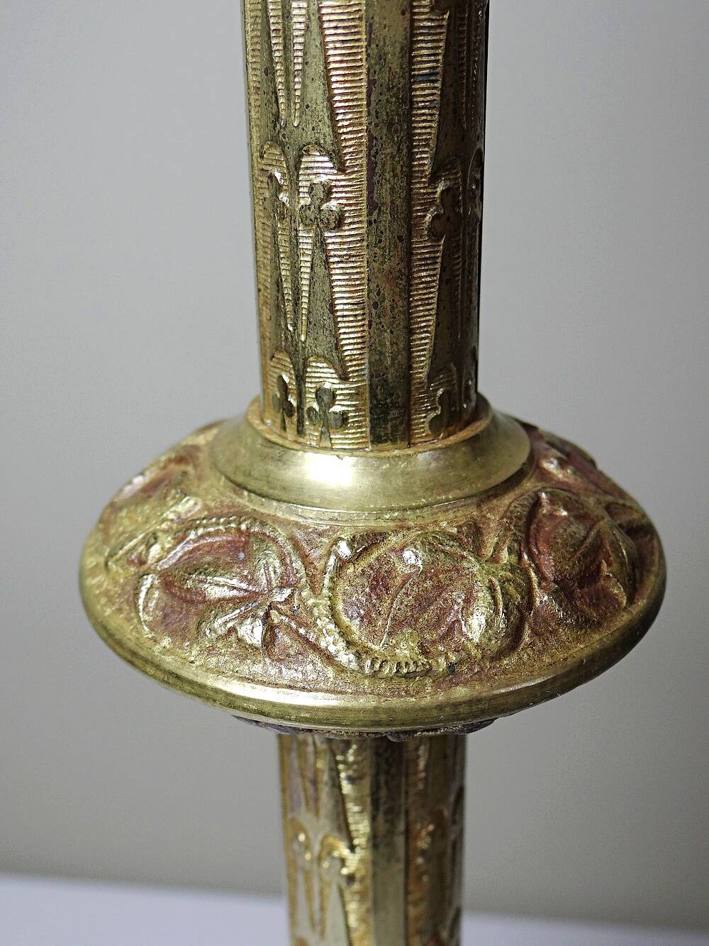 Large pair of antique gilded bronze candlesticks, Gothic style from the 19th century.
