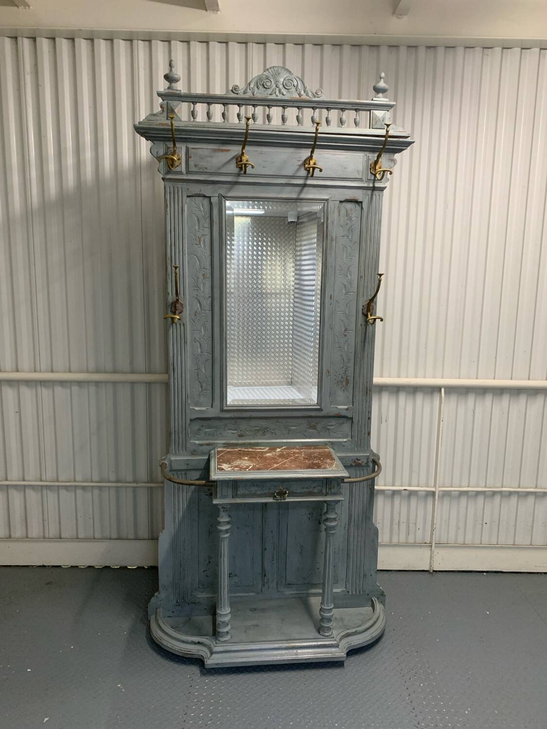 Wall mounted coat rack