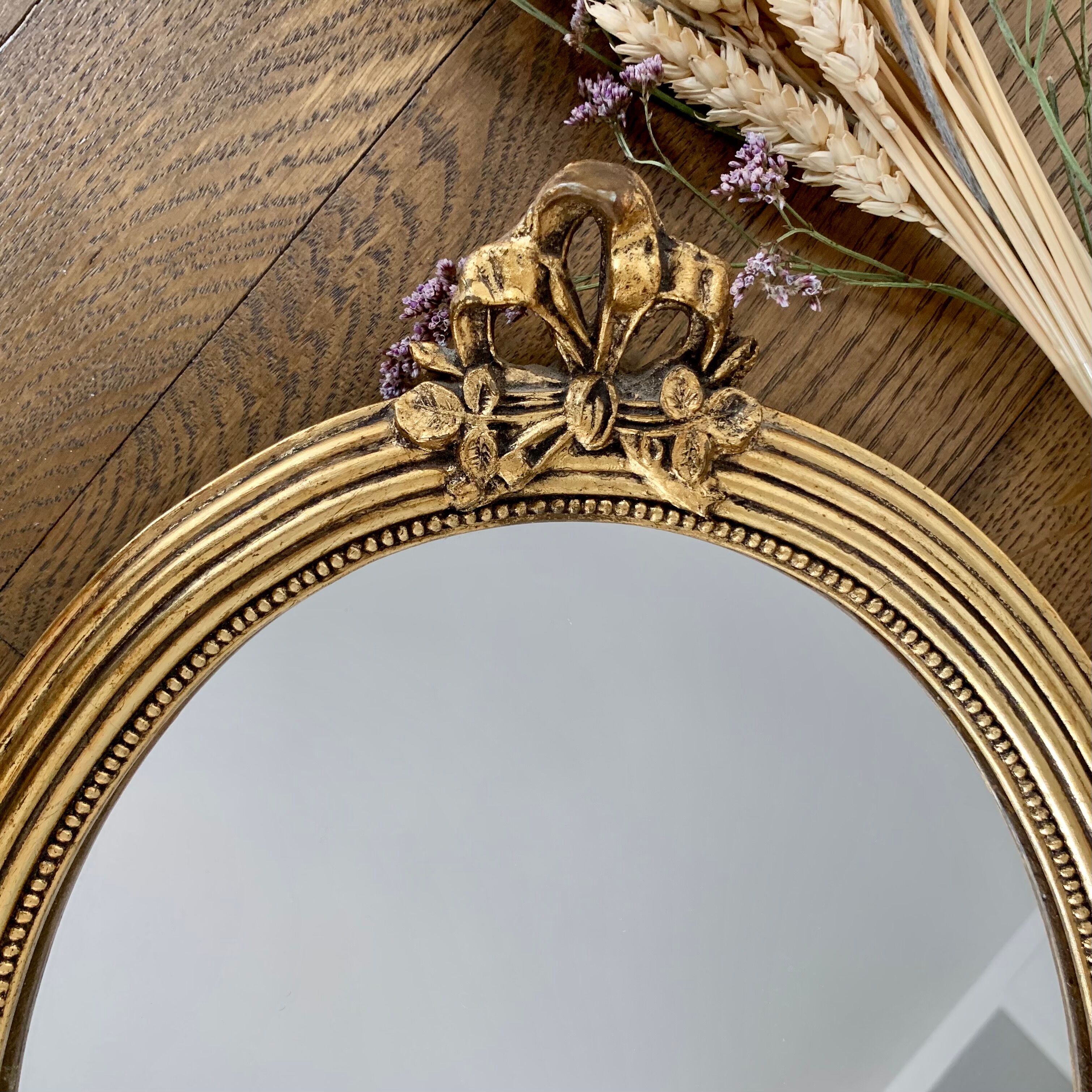 Oval gold mirror 37x27cm