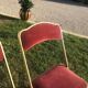 Pair of foldable red velvet chairs