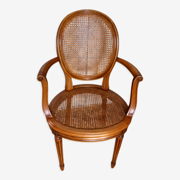 Fauteuil médaillon canné de style Louis XVI