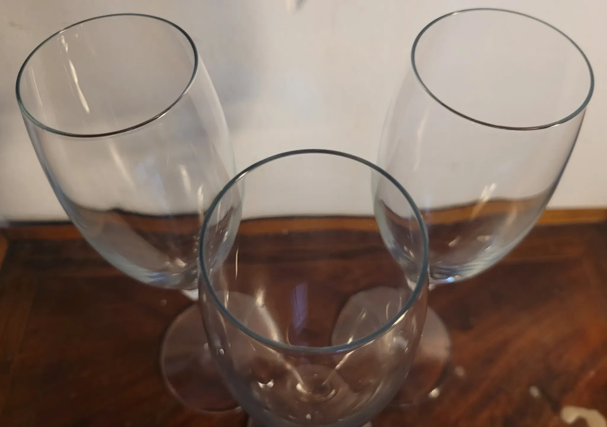 3 large crystal champagne flutes. No brand.