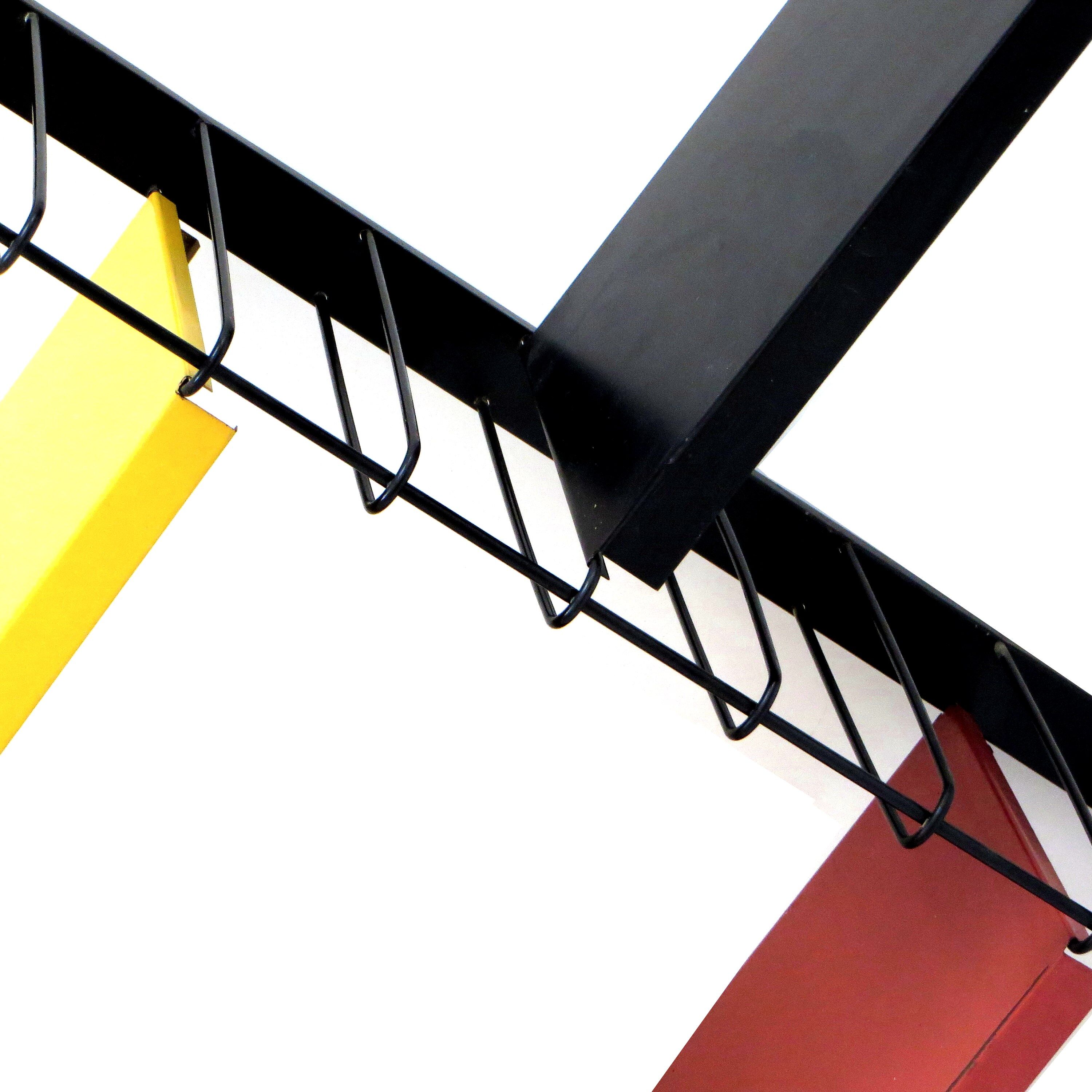 Vintage bookshelf / wall system from Tomado in metal with black frame with 5 shelves