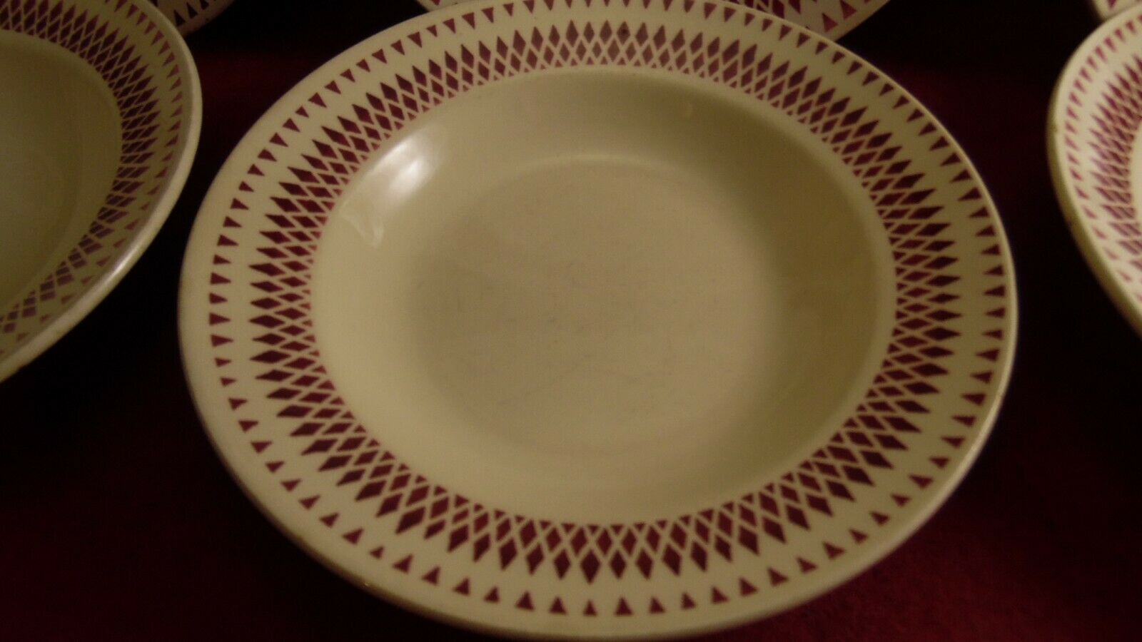 Service of 6 hollow plates in Faince of Badonviller decoration of red bevels