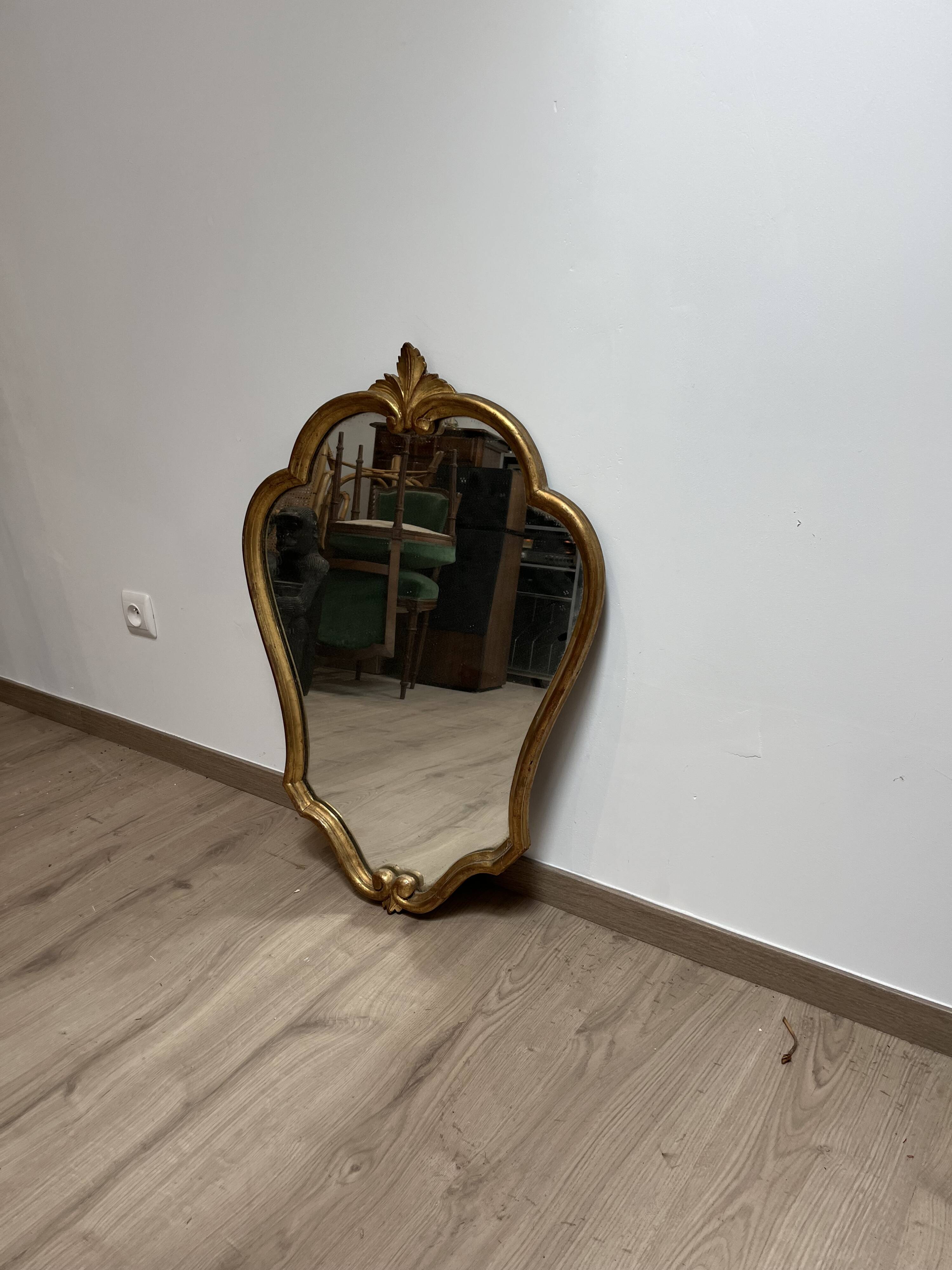 Mirror in wood and gilded stucco, 19th century