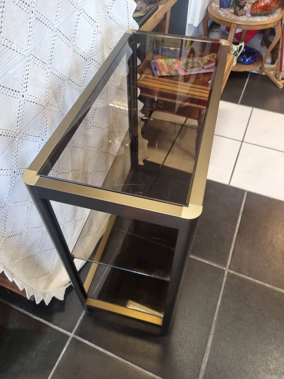 Vintage smoked glass console design