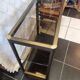 Vintage smoked glass console design