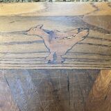 Coffee table in several types of solid wood.