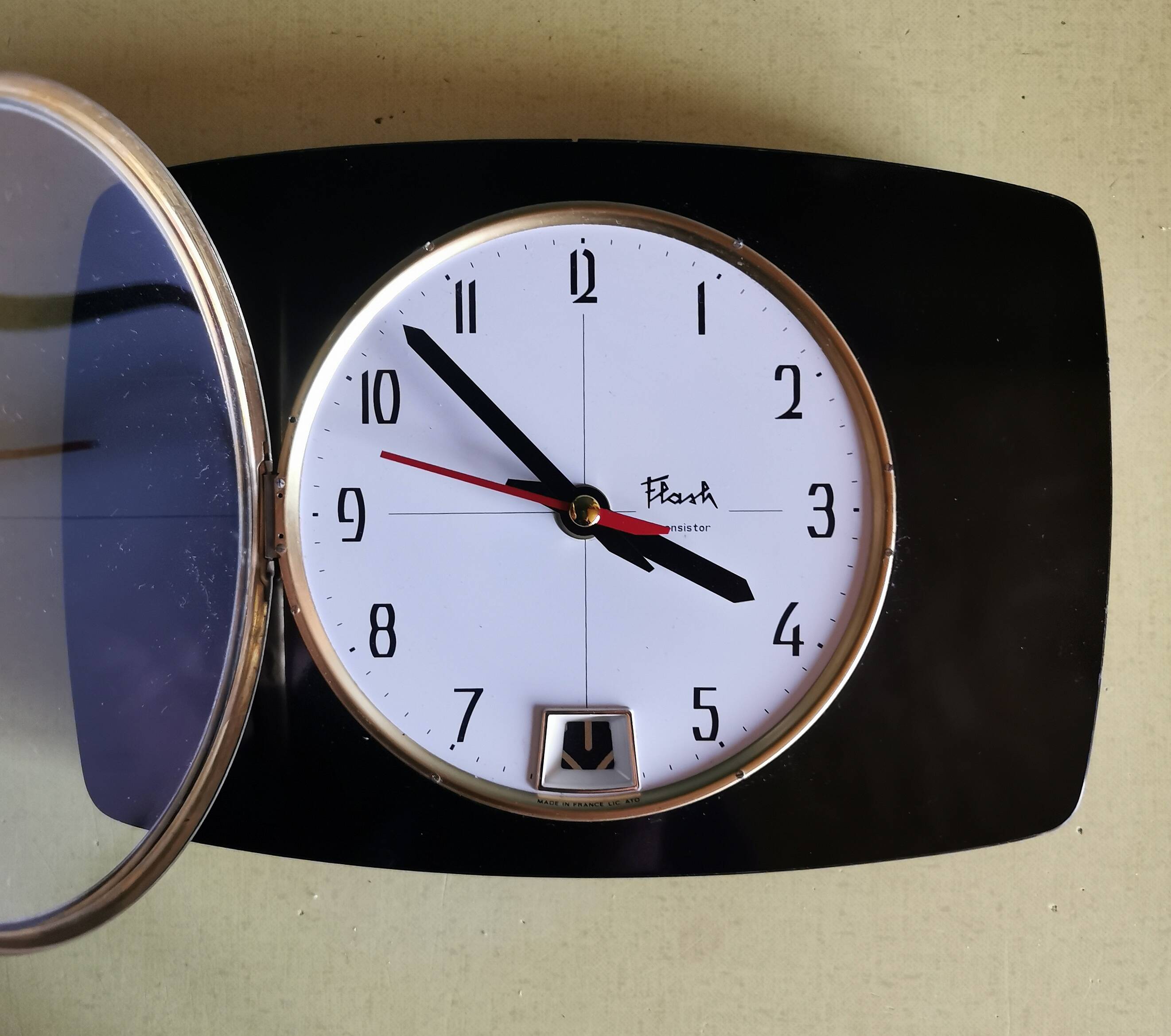 Vintage formica clock rectangular silent wall pendulum "Black transistor flash"