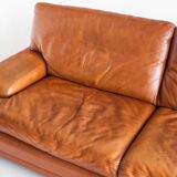 Vintage three-seater leather sofa. Edition by Roche Bobois. France, 70s-80s