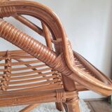 Pair of vintage rattan armchairs circa the 1970s.