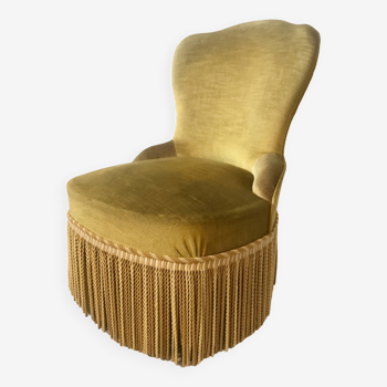 Fauteuil crapaud en velours doré